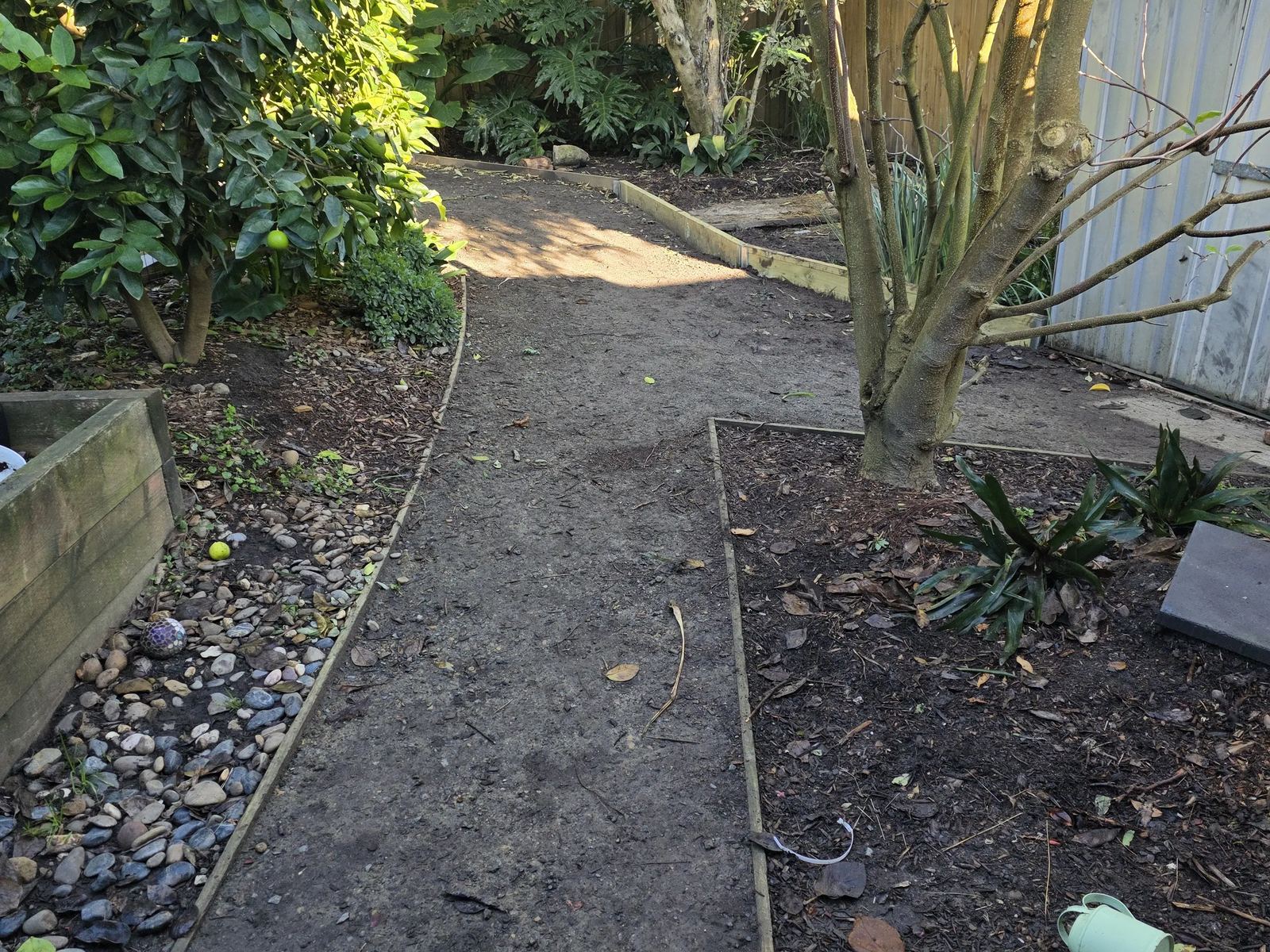 Backyard cleared back to bare ground in Frankston, with all green waste and rubbish taken away
